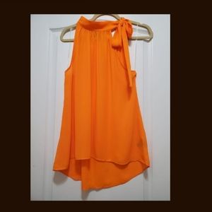 Sleeveless turtleneck blouse